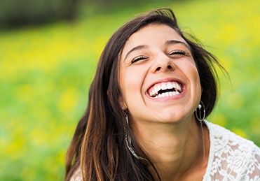 Happy young woman with healthy smile
