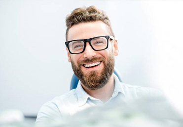 Man smiling in the dental chair