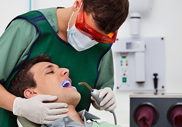 Man receiving dental treatment