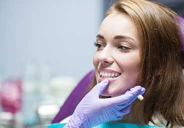 Smiling woman in dental chair